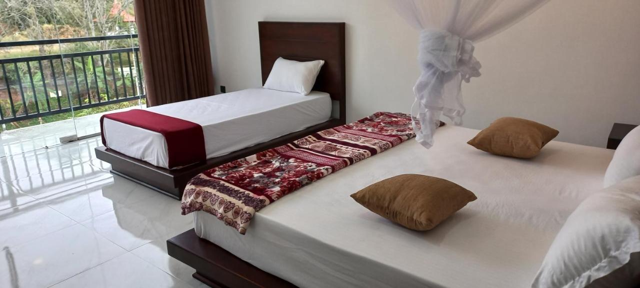 Ella Odyssey Inn Phòng bức ảnh